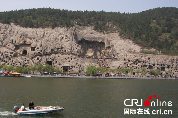 【多语种报道】朝鲜语记者李昌男：龙门石窟体现中国人的爱国情节