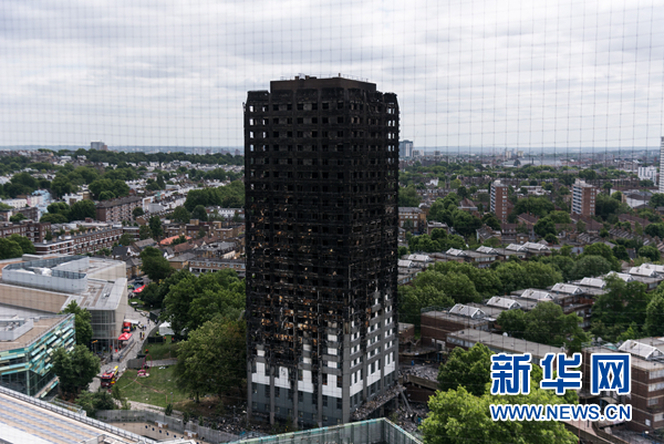 伦敦警方推定居民楼火灾中至少58人死亡