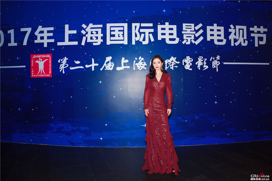 图片默认标题_fororder_杨幂亮相成龙动作电影周