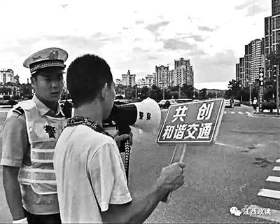 江西吉安交警出新招：闯红灯者要喊100遍“我不再闯”