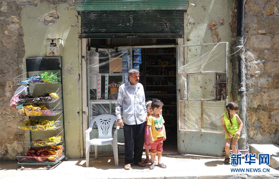 记者手记：艰难困顿　生生不息——记危楼中顽强生活的阿勒颇居民