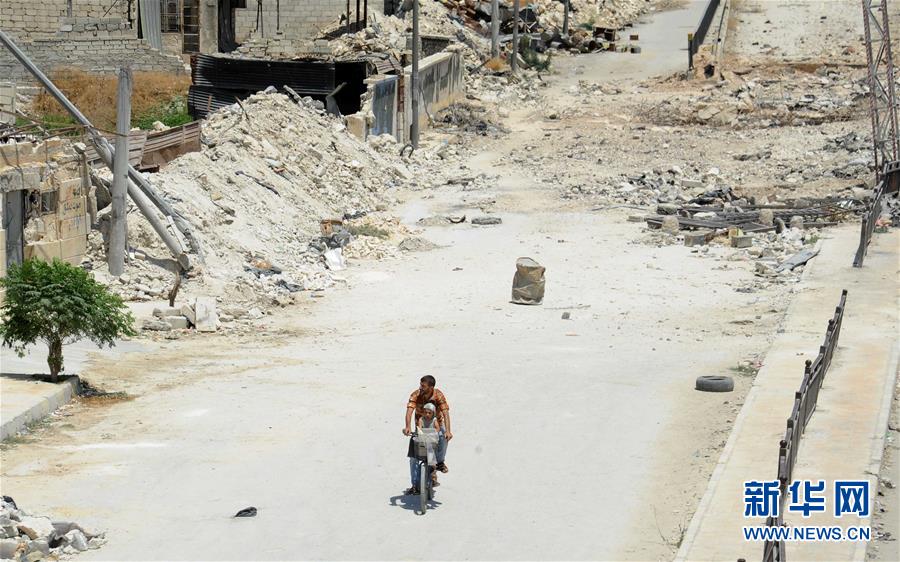 记者手记：艰难困顿　生生不息——记危楼中顽强生活的阿勒颇居民