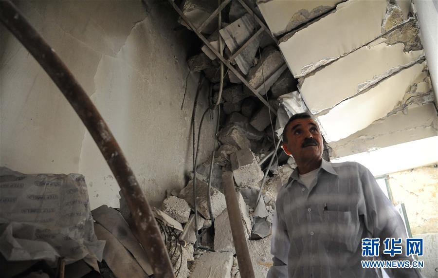 记者手记：艰难困顿　生生不息——记危楼中顽强生活的阿勒颇居民