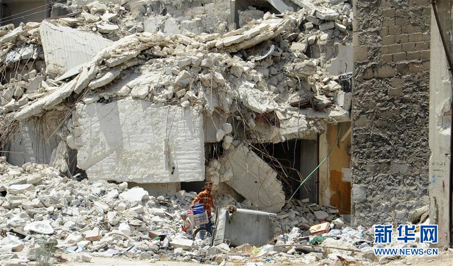 记者手记：艰难困顿　生生不息——记危楼中顽强生活的阿勒颇居民